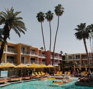 swimming pool surrounded by hotel rooms | Hotel inventory system | HiRUM