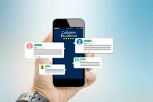 phone with customer reviews popping out | managing online business reviews | HiRUM